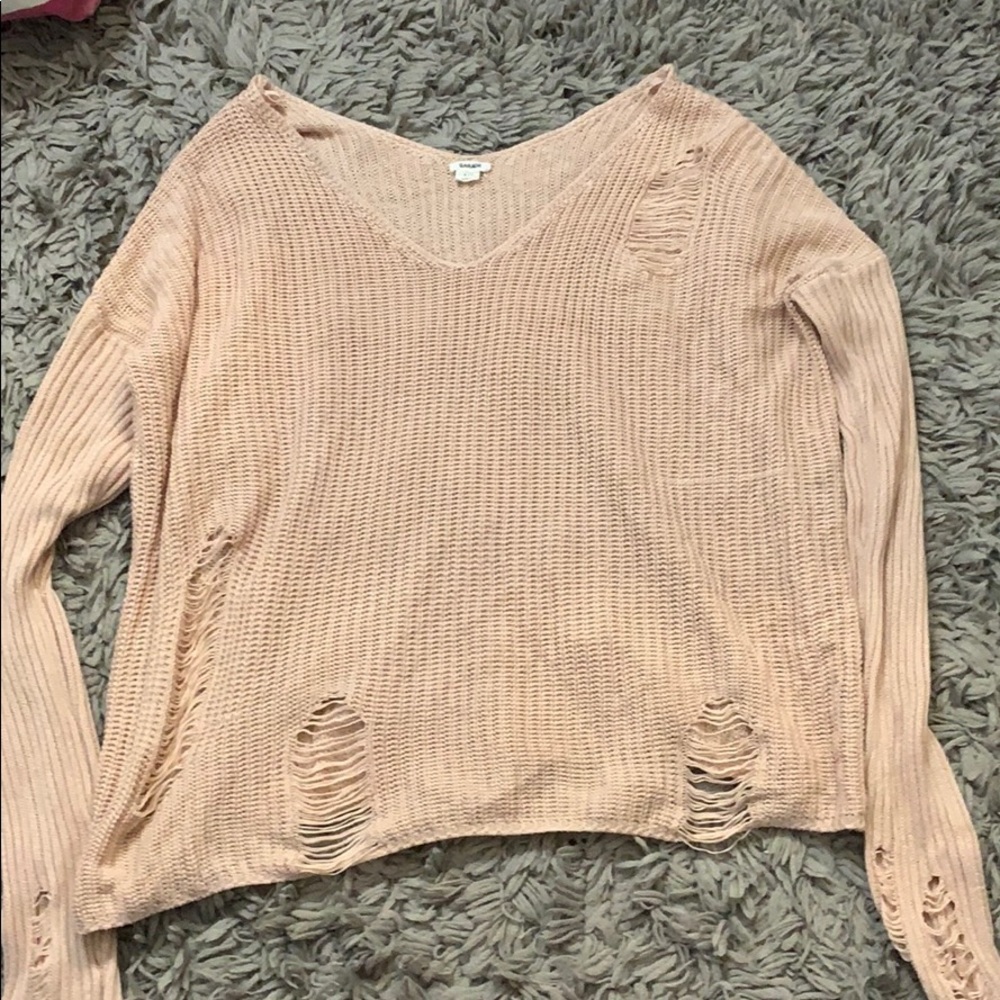 Ripped light pink sweater from garage